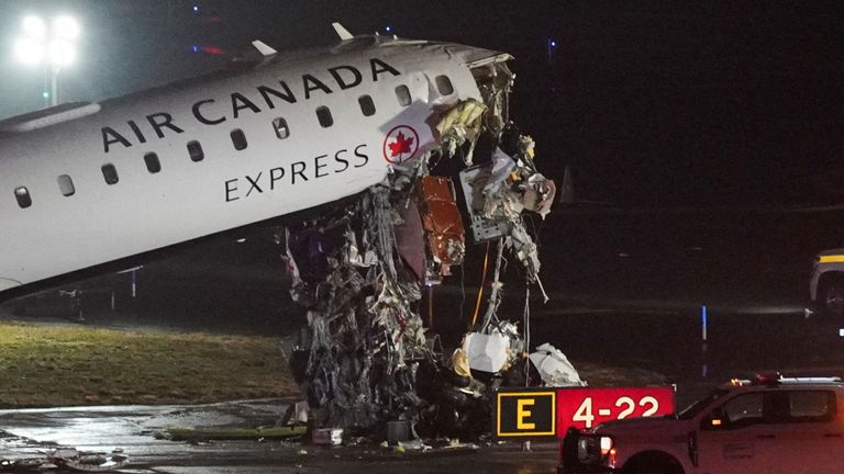 Two pilots killed, passengers wounded as plane crashes into vehicle